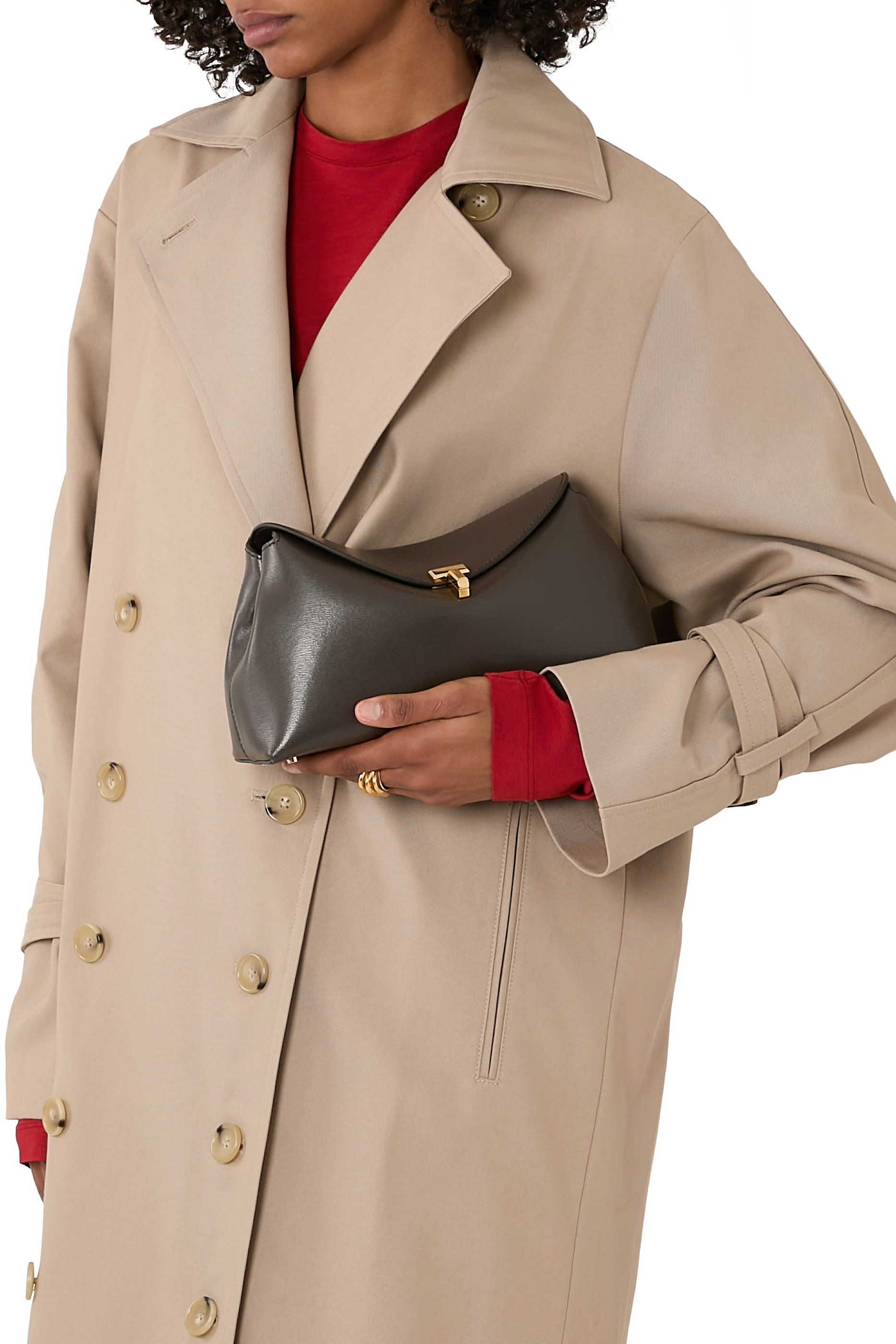 حقيبة كلاتش بقفل على شكل حرف T جلد