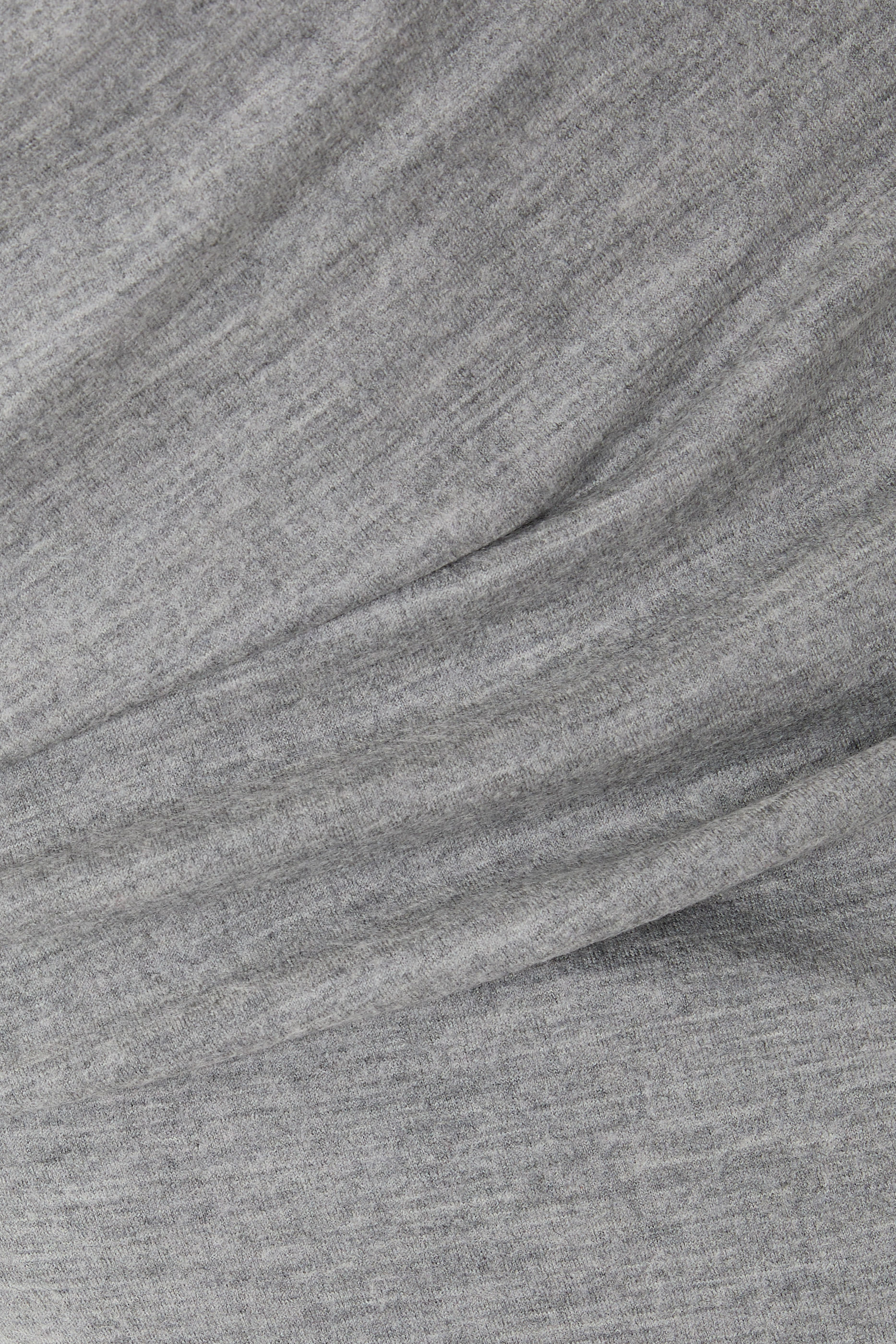 تنورة متوسطة الطول بطيات صوف