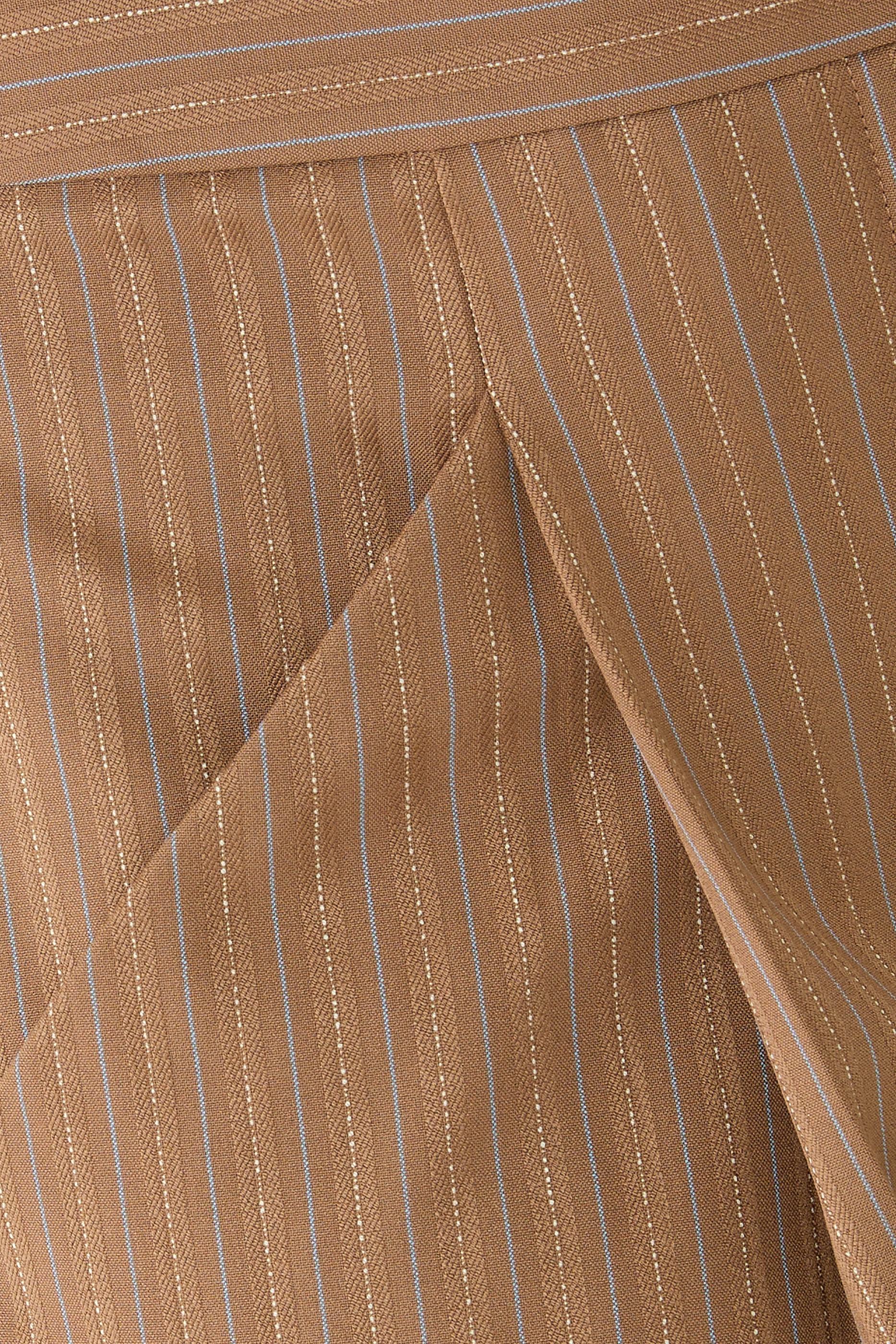 بنطال ريميني بقصة ساق واسعة