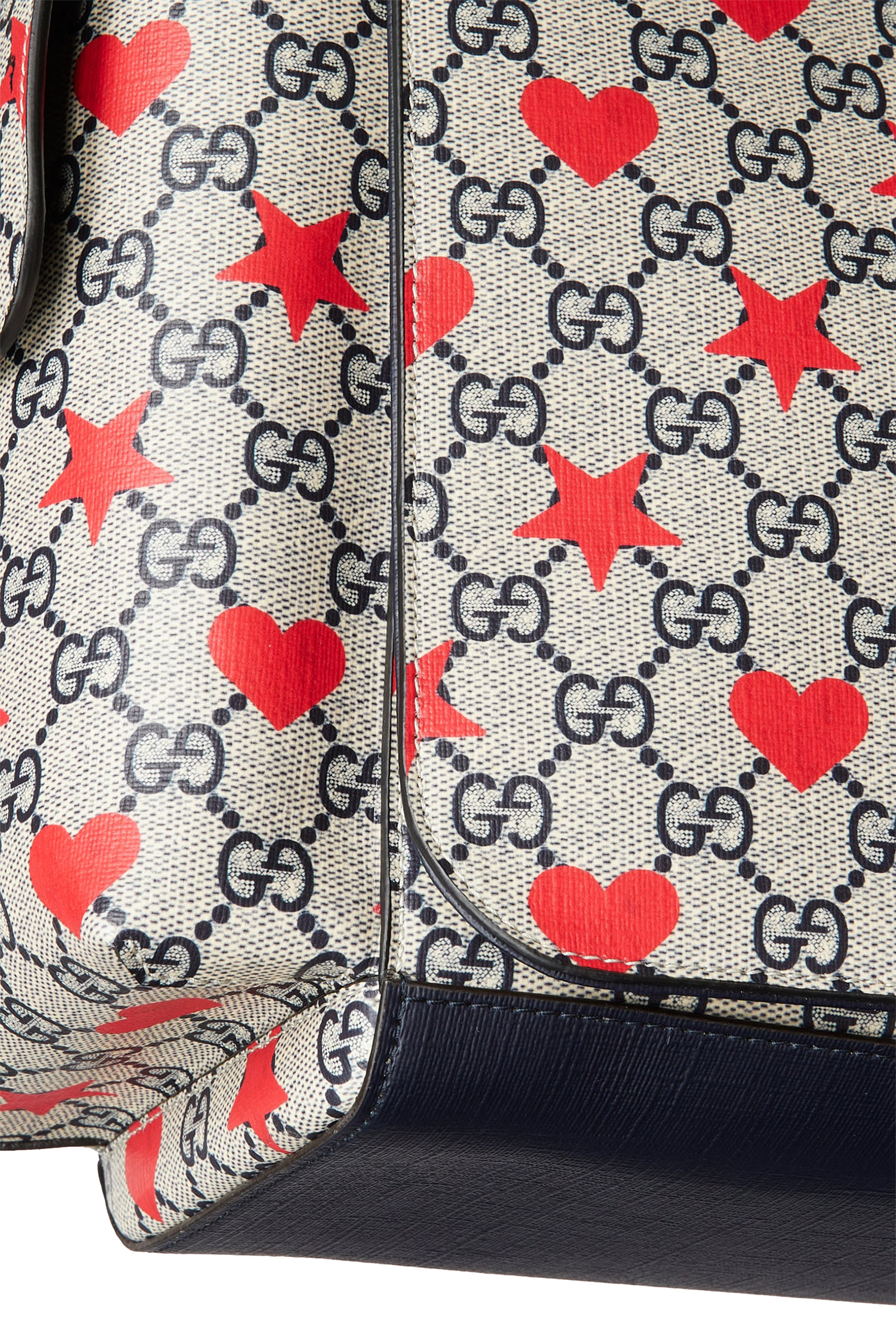 حقيبة مستلزمات أطفال بنقشة حرفي شعار الماركة