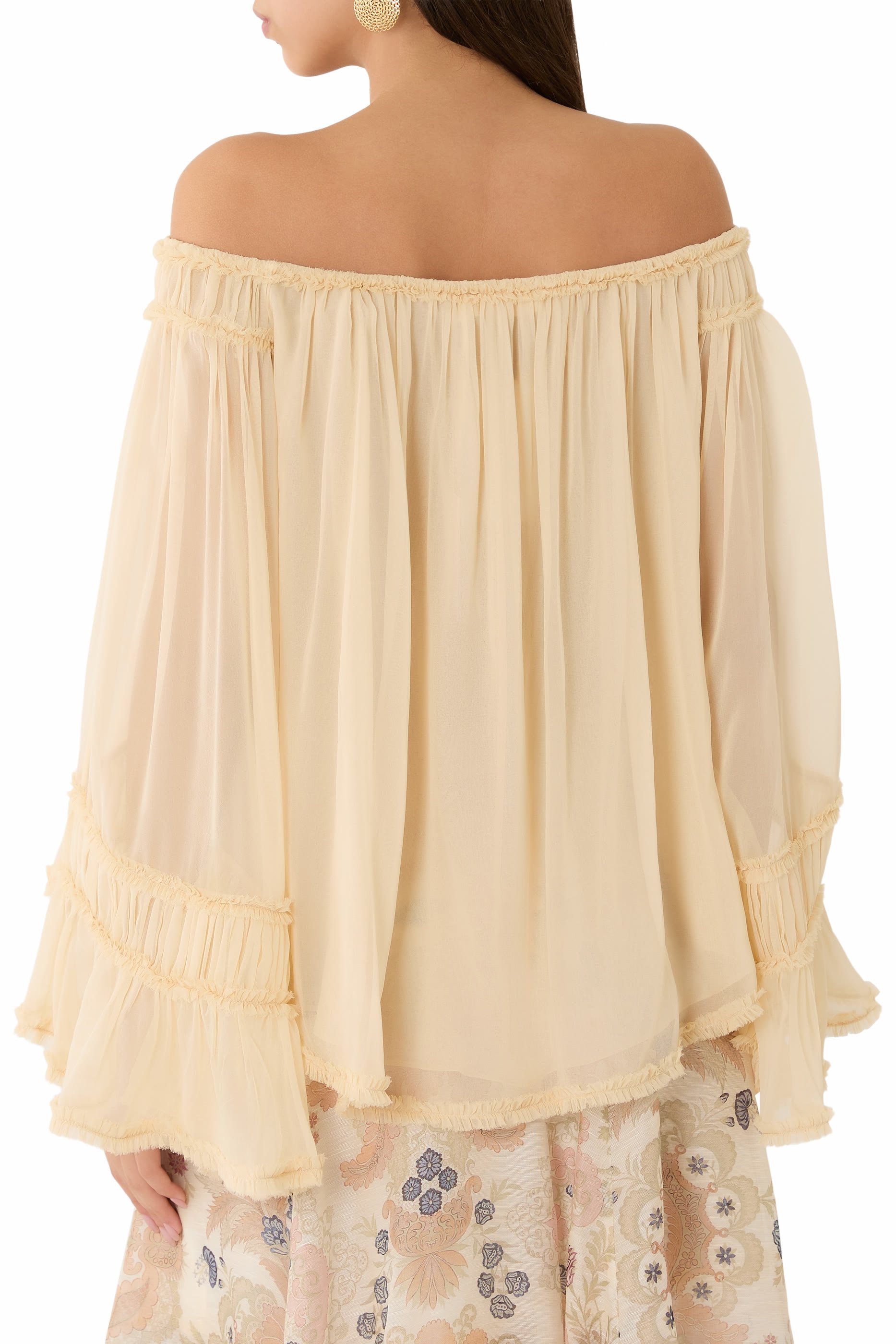 بلوزة ريبالين بقصة مريحة وحافة منسلة