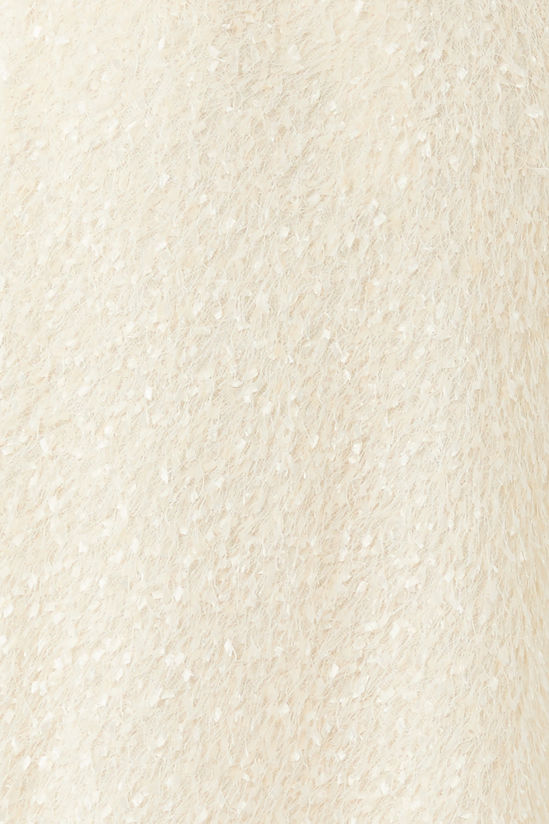 تنورة مزينة بشراشيب وريش