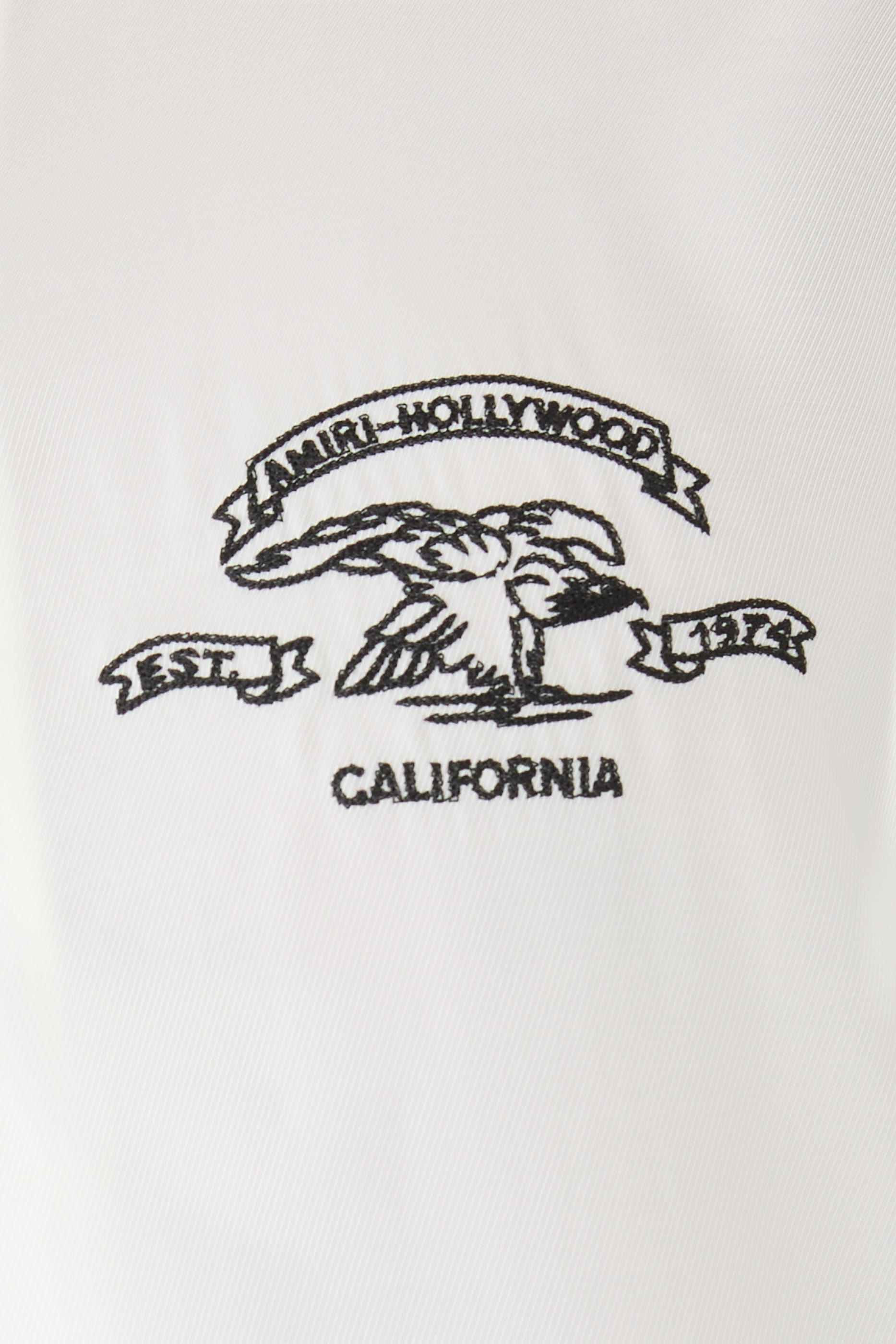 قميص بياقة بطيّة