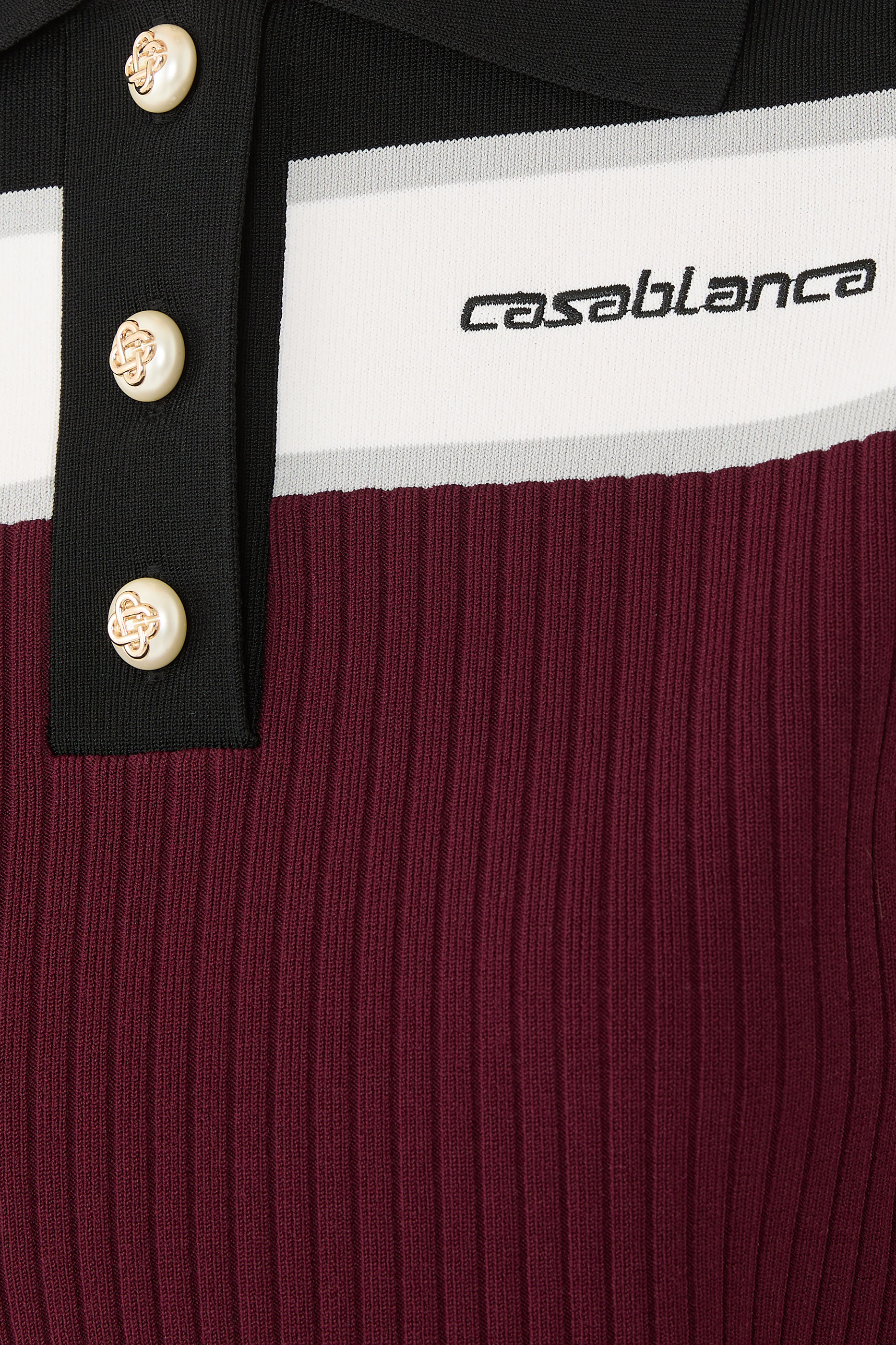 قميص بولو مخطط بأكمام قصيرة