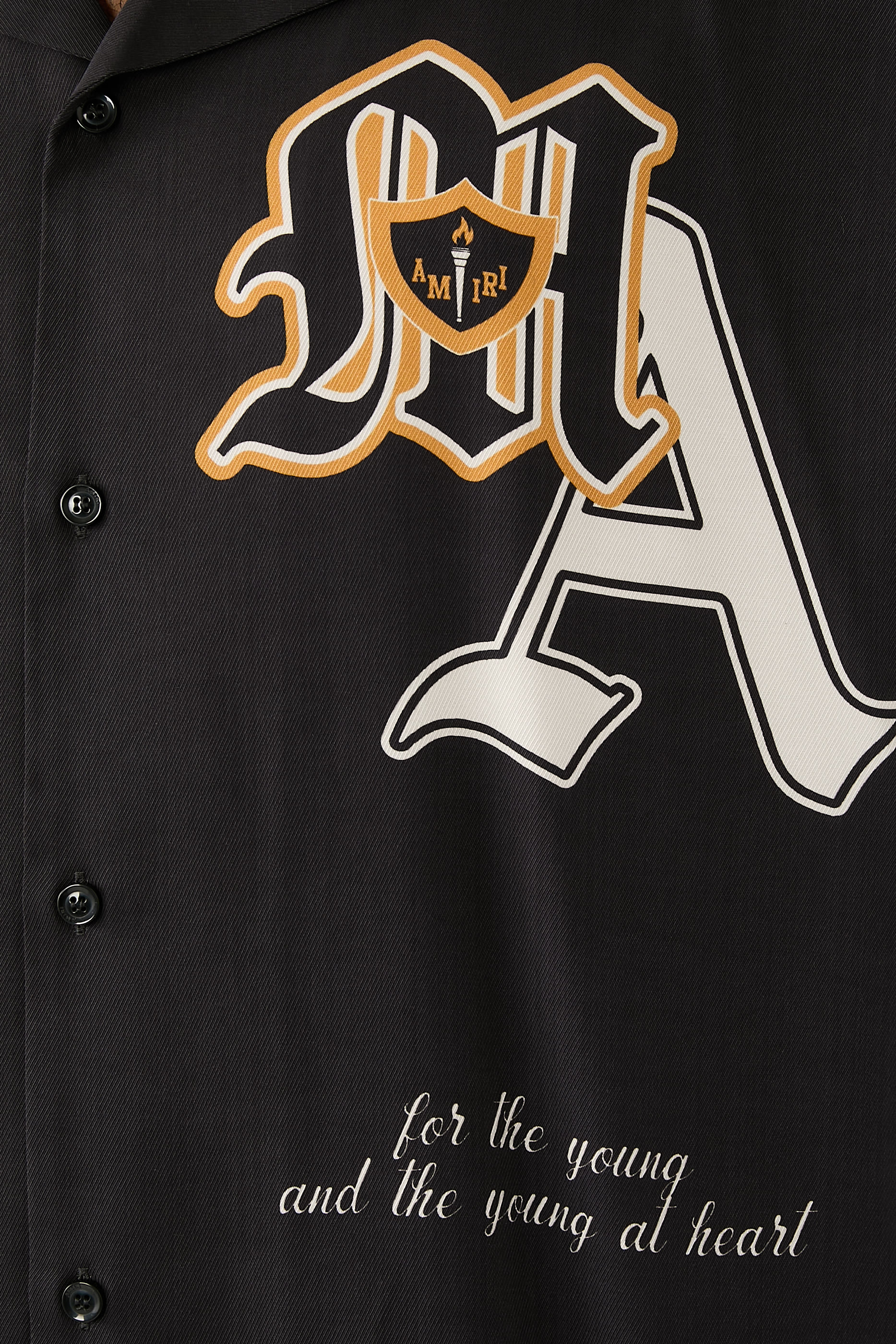 قميص بقصة فضفاضة بياقة مطوية ورقع بتصميم جامعي