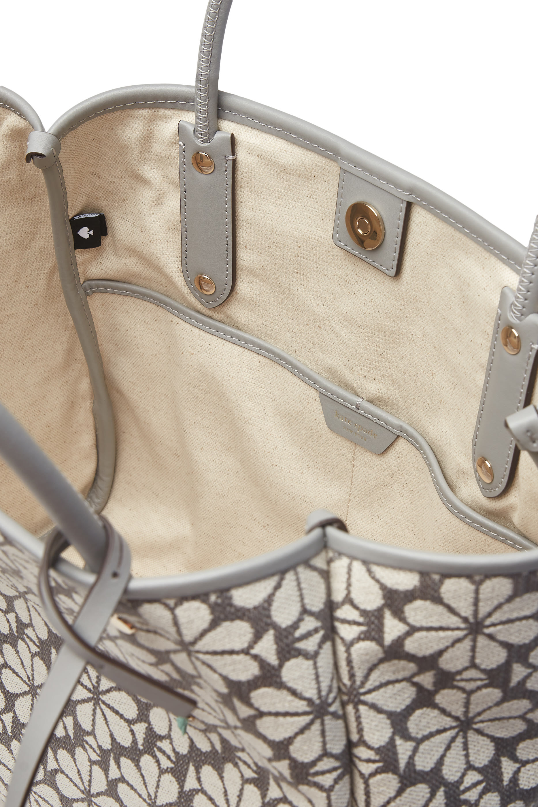 حقيبة يد متوسطة بنقشة زهور بالشكل البستوني